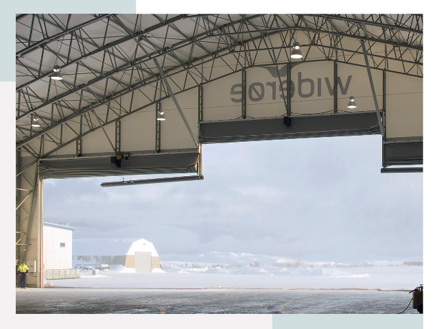 Ворота для ангаров в лесном